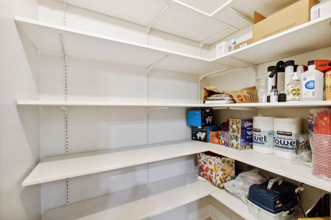 Walk-in pantry with plenty of storage. | Image 15