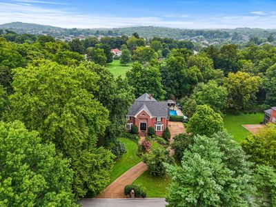 Gorgeous rolling hills and mature trees but conveniently located off of Crockett Rd. with easy access to Cool Springs Shopping and close to Interstate 65. | Image 1