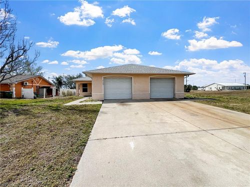 2130 Ne 8th Pl, Cape Coral, FL, 33909-4460 | Card Image