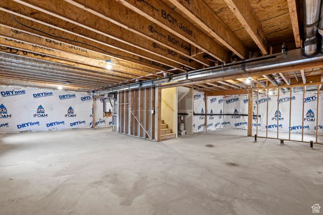 Unfinished basement featuring stairway | Image 47
