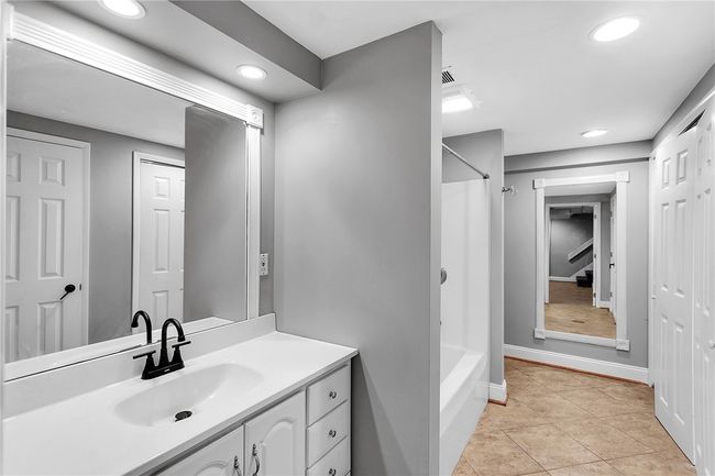 Full bath and in basement with secondary laundry area | Image 36