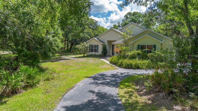 11933 Pasco Trails Blvd, House other with 4 bedrooms, 3 bathrooms and null parking in SPRING HILL FL | Image 43