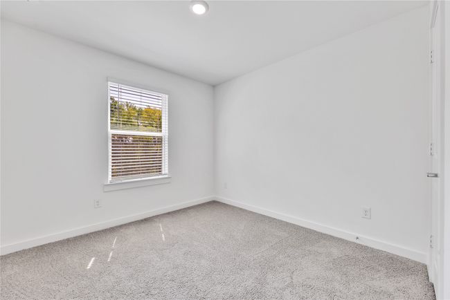 Carpeted spare room featuring baseboards | Image 20