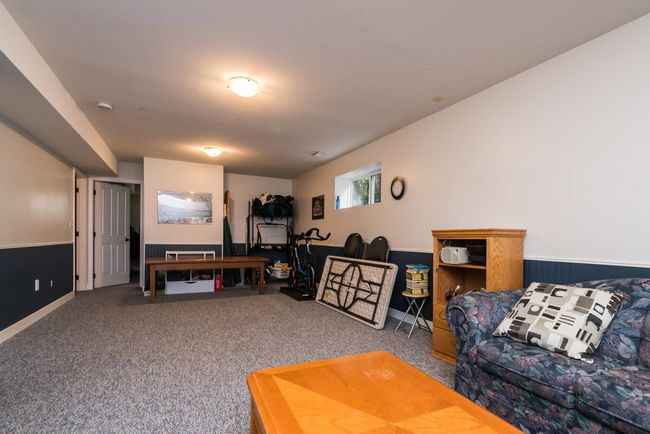 View of carpeted living area | Image 22
