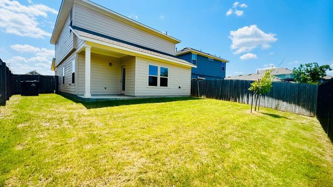 Back of house with a fenced backyard | Image 38