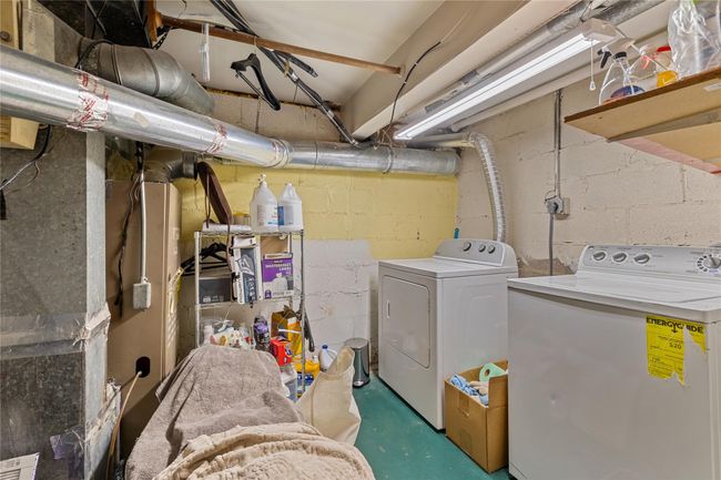 Laundry area featuring separate washer and dryer and laundry area | Image 40