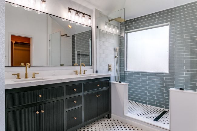 You will love getting ready in the morning in your updated primary bathroom. | Image 20