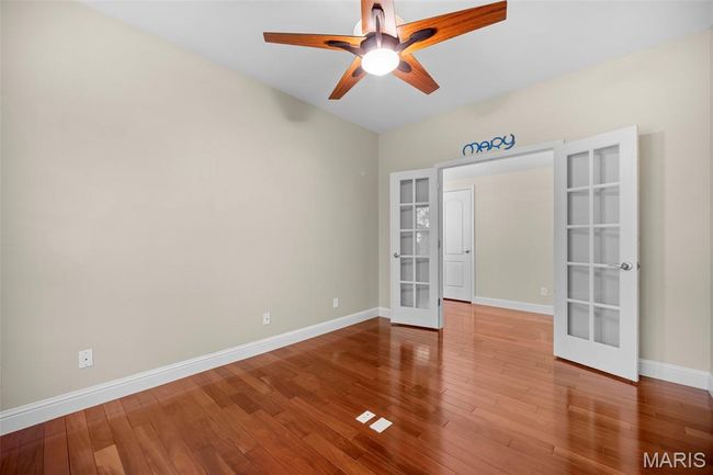 Home Office off the Primary Suite-- Gleaming hardwood floors. | Image 19