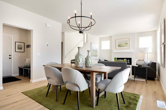 Dining room has room to expand when entertaining large groups! | Image 4