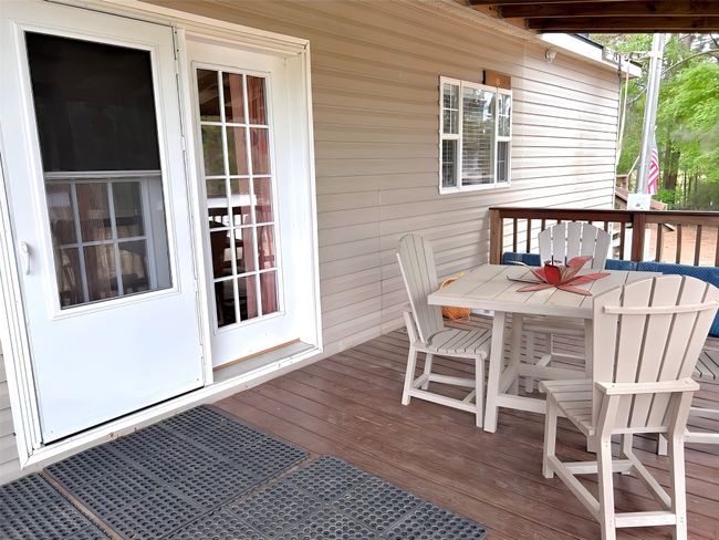 Wooden deck with outdoor dining space | Image 31