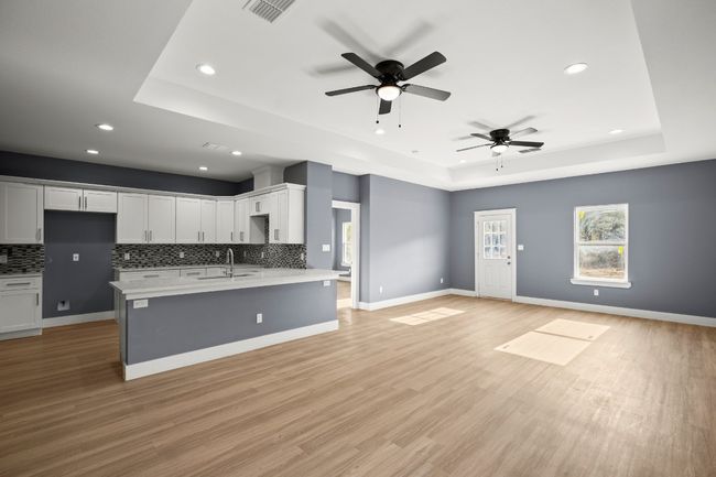 OPEN KITCHEN TO LIVING ROOM AND DINNING AREA | Image 7
