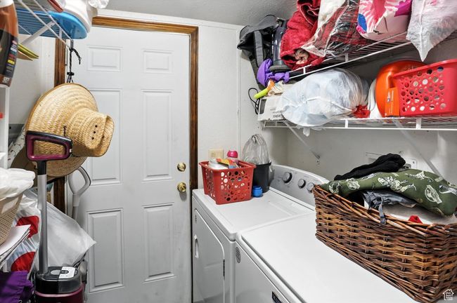 Washroom with washing machine and dryer | Image 19