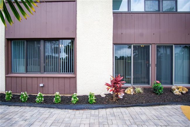 Underground sprinkler system allows for easy watering of plants | Image 5