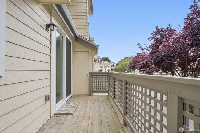Deck off dining room complete with a small storage closet | Image 38