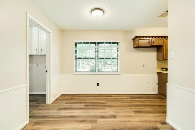 Breakfast area between the kitchen and family room. | Image 14