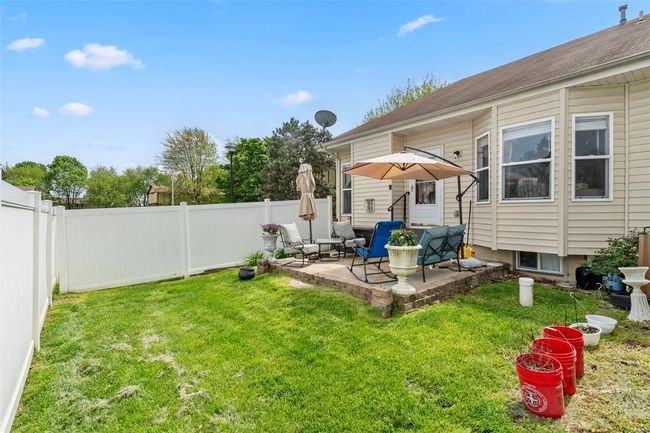 Garage with a garage door opener | Image 18