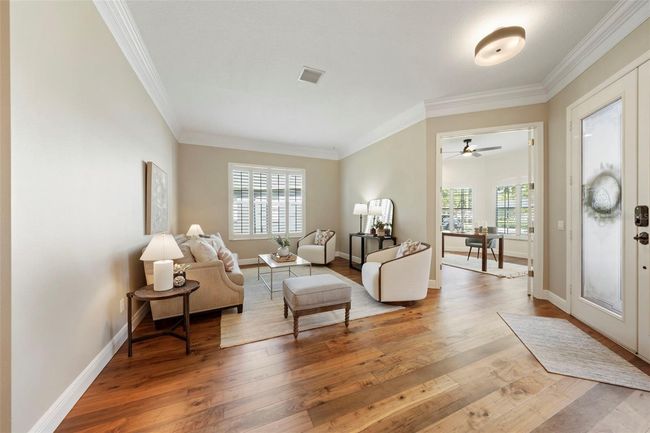 Separate sitting/living room in front of home. | Image 6