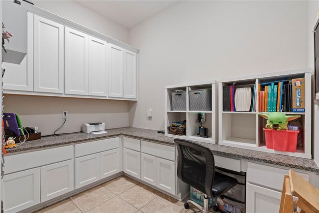 Office/crafting room off of the kitchen. | Image 18