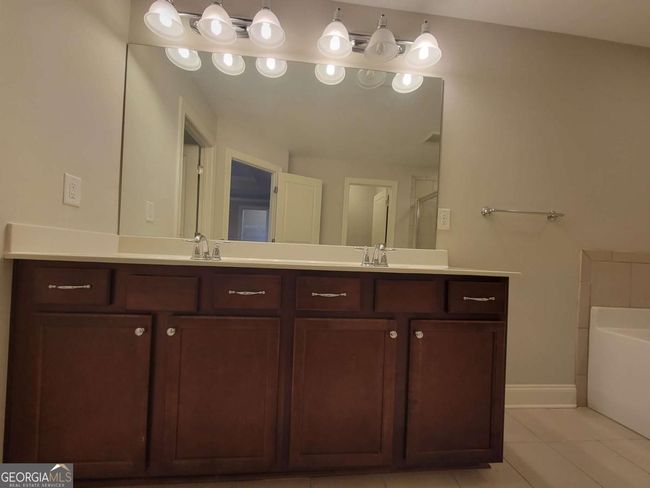 8265 Village Pl, Townhouse with 3 bedrooms, 3 bathrooms and 2 parking in Suwanee GA | Image 22