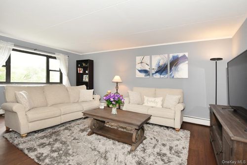 4n-100 Clinton Ave, Mineola, NY, 11501-2850 | Card Image