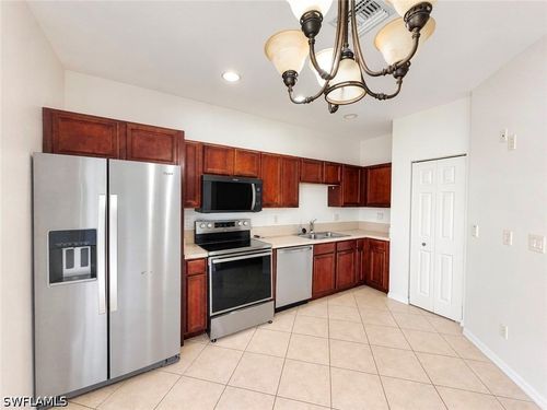 9706 Roundstone Cir, FORT MYERS, FL, 33967-5157 | Card Image