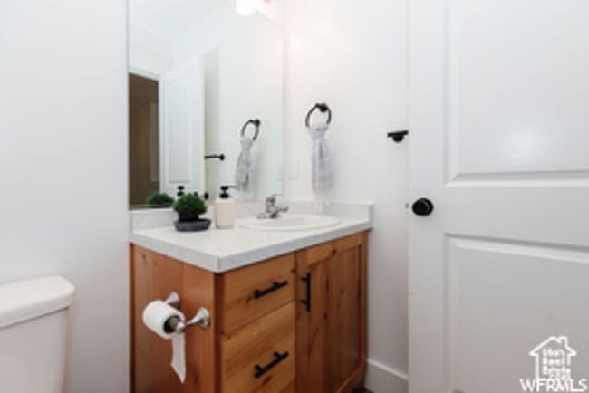 Bathroom with vanity and toilet | Image 5
