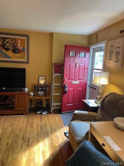 Living room with hardwood flooring | Image 3