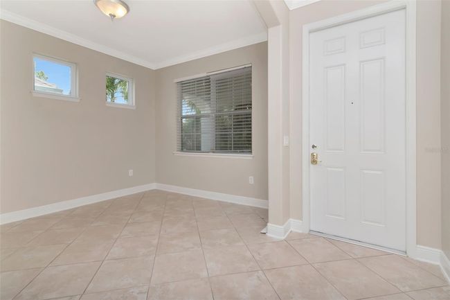 7703 S Fitzgerald St, House other with 4 bedrooms, 3 bathrooms and null parking in Tampa FL | Image 4