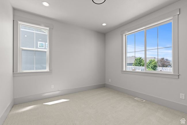 Carpeted spare room featuring recessed lighting | Image 15