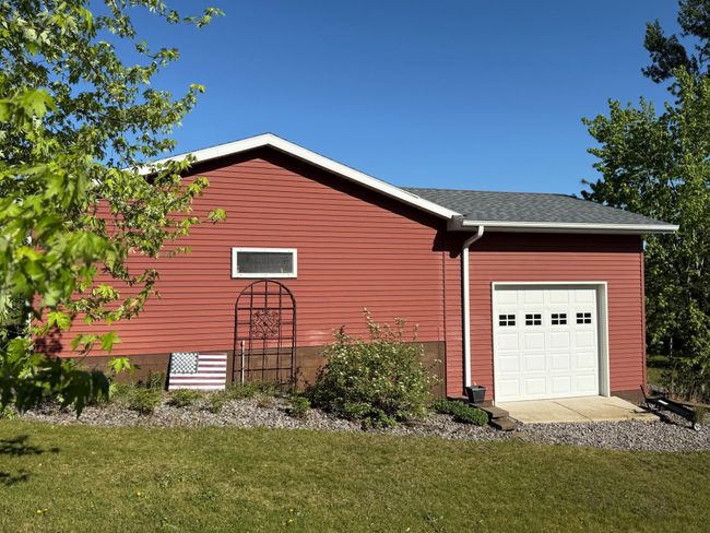 Oversized additional heated 1 stall garage/shop for extra storage and projects! | Image 24