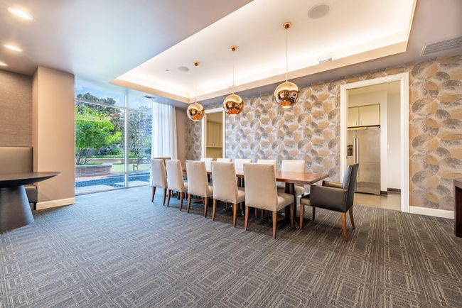 Expansive dining area seamlessly connected to the lounge. | Image 25