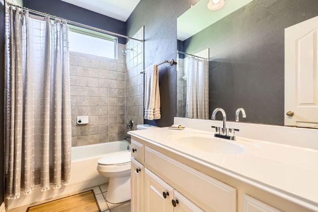 First floor full bath with shower / bathtub combination | Image 13