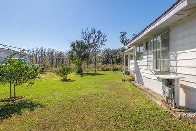 5550 Bird Island Drive, House other with 3 bedrooms, 2 bathrooms and null parking in Lady Lake FL | Image 2