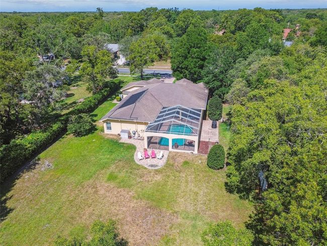 18502 Winding Oaks Blvd, House other with 4 bedrooms, 3 bathrooms and null parking in Hudson FL | Image 85