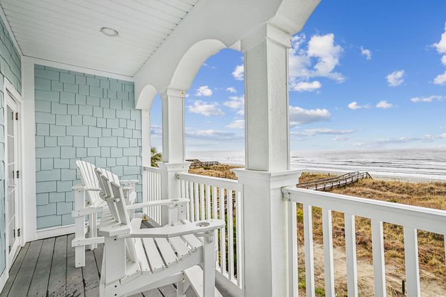 Balcony featuring view of water and beach | Image 16