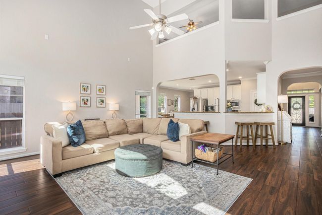 Family room that opens to kitchen and breakfast area | Image 14