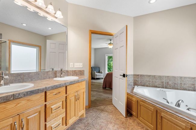 10605 Fernwood Ln N, House other with 5 bedrooms, 4 bathrooms and null parking in Champlin MN | Image 19