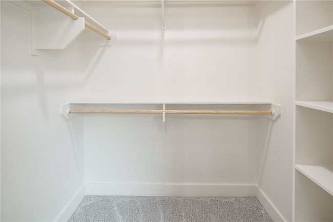 Walk in closet with carpet | Image 27