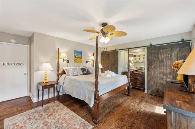 Large primary bedroom with spacious double closets, ample storage, and ensuite full bathroom. | Image 44