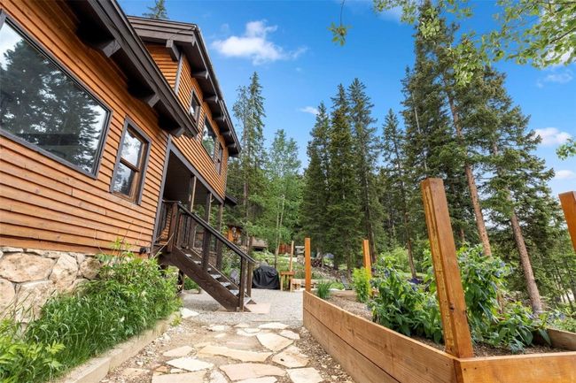 View of patio with raised bed | Image 36