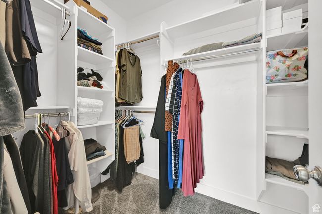 Spacious closet featuring carpet floors | Image 27