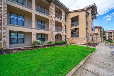 1026 - 909 Charo Parkway, Condo with 4 bedrooms, 3 bathrooms and null parking in Davenport FL | Image 1