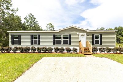 11091 Ne 61 St Street, House other with 3 bedrooms, 2 bathrooms and null parking in BRONSON FL | Image 1