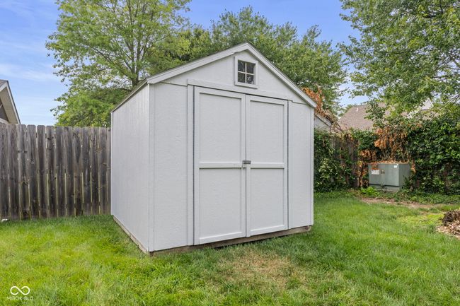 view of shed featuring a fenced backyard | Image 35