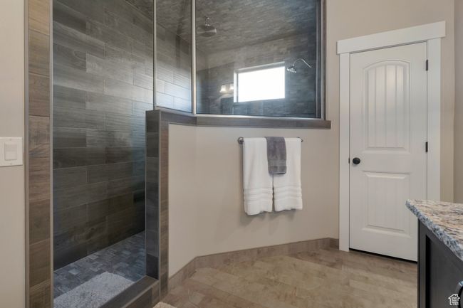 Full bathroom with a walk in shower and vanity | Image 25