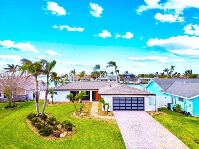 Stunning, Waterfront Home with a Dock on Boca Ciega Bay!!! | Image 1