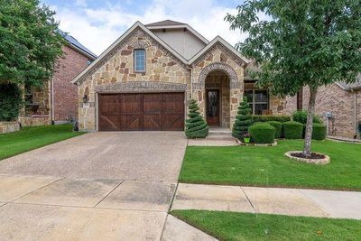 View of front of property with a garage and a front yard | Image 2