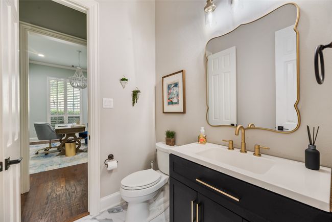 Half bath featuring vanity and ornamental molding | Image 15