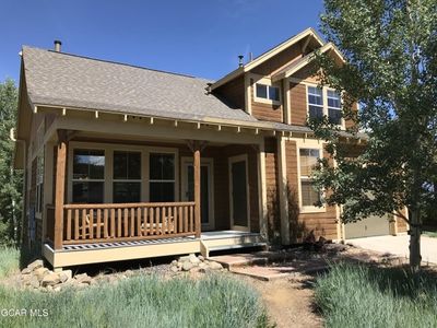 Rear view of house with covered porch | Image 2