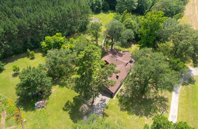View from above of property featuring a forest | Image 40